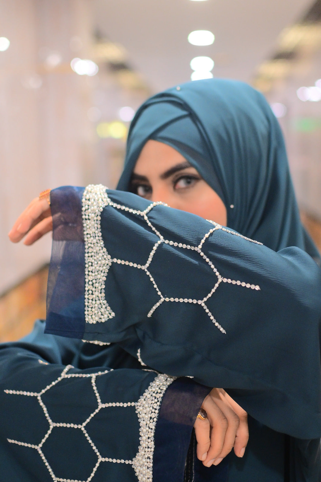 Dhaagey Azure Lattice abaya white crystal and micro-pearl sleeve detailing