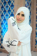 Dhaagey Pearl Blossom ivory white abaya with 3D floral vine detailing